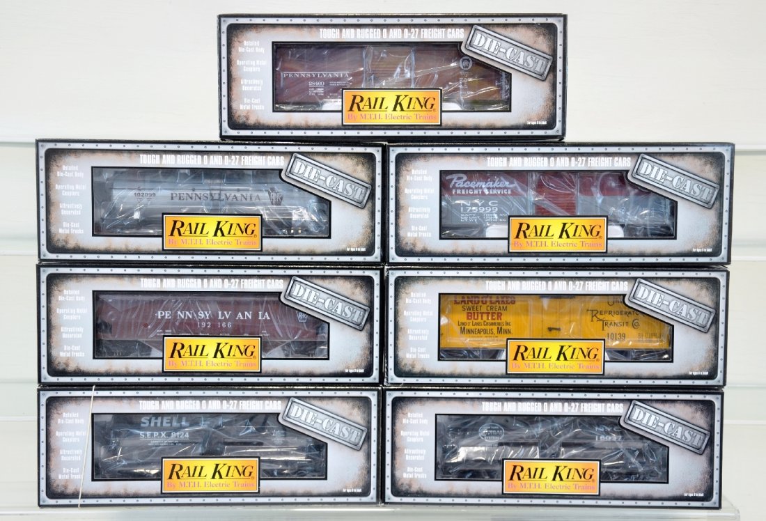 7 MTH RailKing Diecast Freight Cars: Includes 30-8003 hopper; 8101 tank car; 8103 tank car; 8104 tank car; 8610 reefer; 8403 boxcar; 8401 boxcar. They show light runtime with C9 bodies & boxes