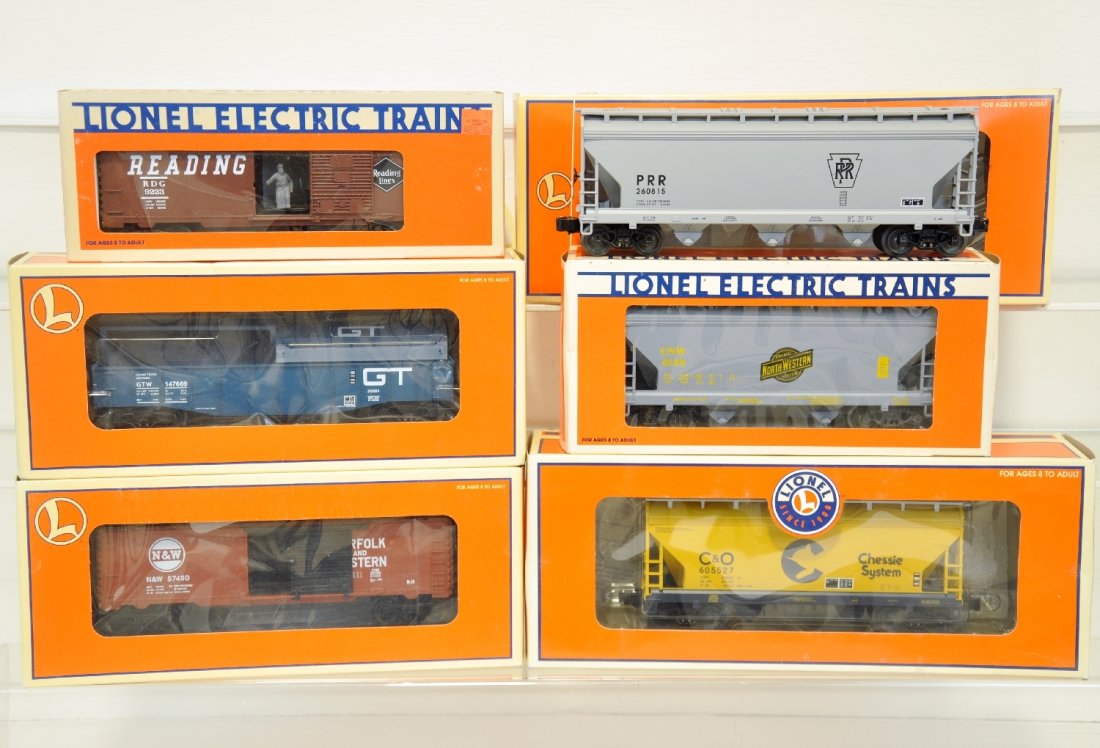 6 Mint Lionel Freight Cars: Includes 17132 PRR 3-bay hopper; 26241 N&W boxcar; 17107 Chessie PS-2 hopper; 9223 Reading operating boxcar; 6135 CNW 2-bay hopper; 36084 GT coil car. All are unrun with boxes, C10