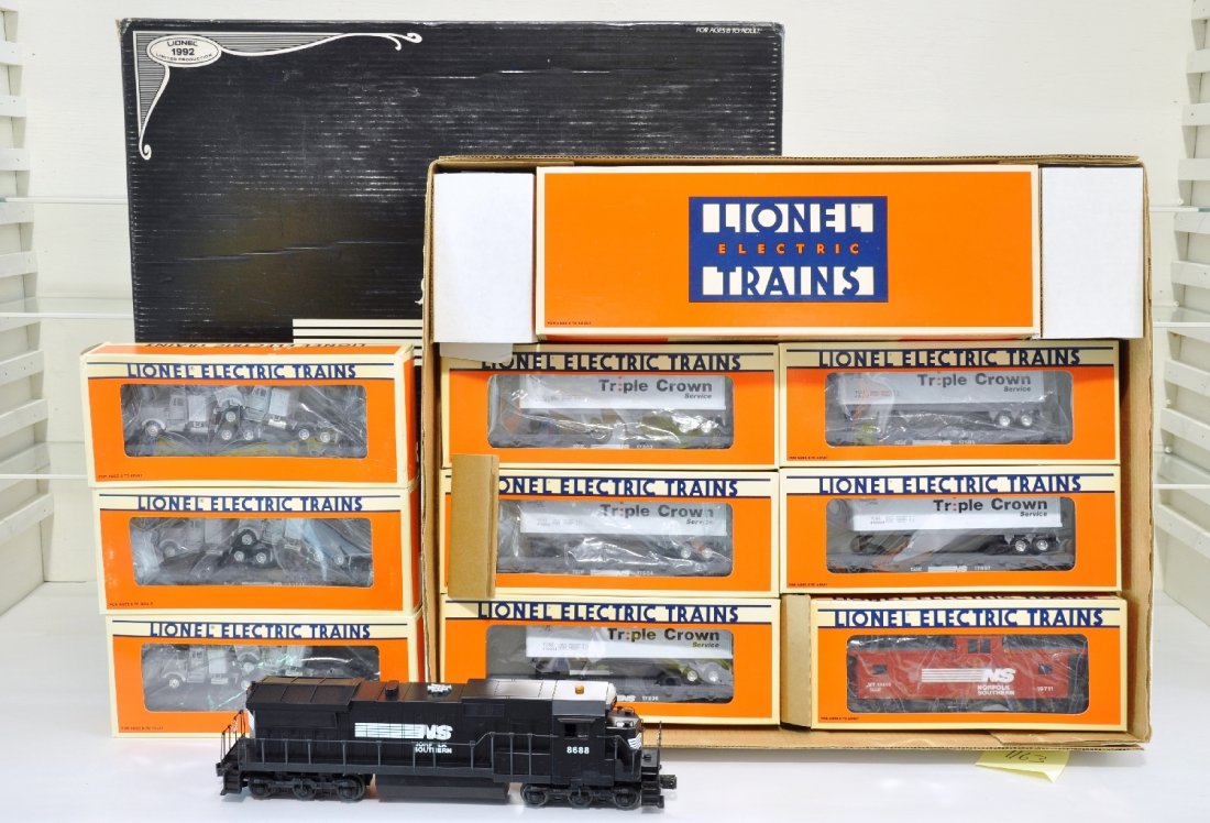 Lionel Extended 11718 NS Piggy-Back Trailer Train: Neat set that includes a 18689 Dash 8-40C diesel with light, dome light & horn; Trailer flats- 17503, 17504, 17505, 17506, 17507 & 19711 caboose. Plus 3 17516 flats with tractors. All show runtime wit