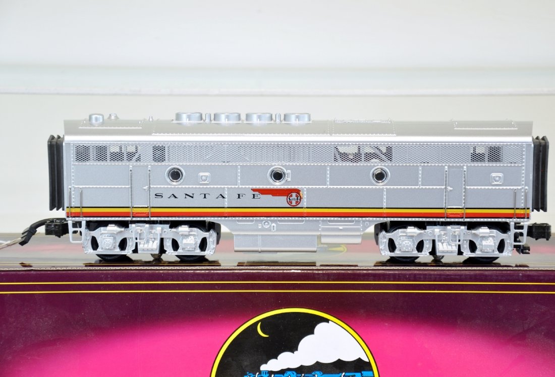 MTH Santa Fe F-3 B Unit 20-2151-4: Powered unit comes equipped with 1/4 Scale dimensions, All metal wheels and gears and operates on O-31 track. Unit is lightly run. C9