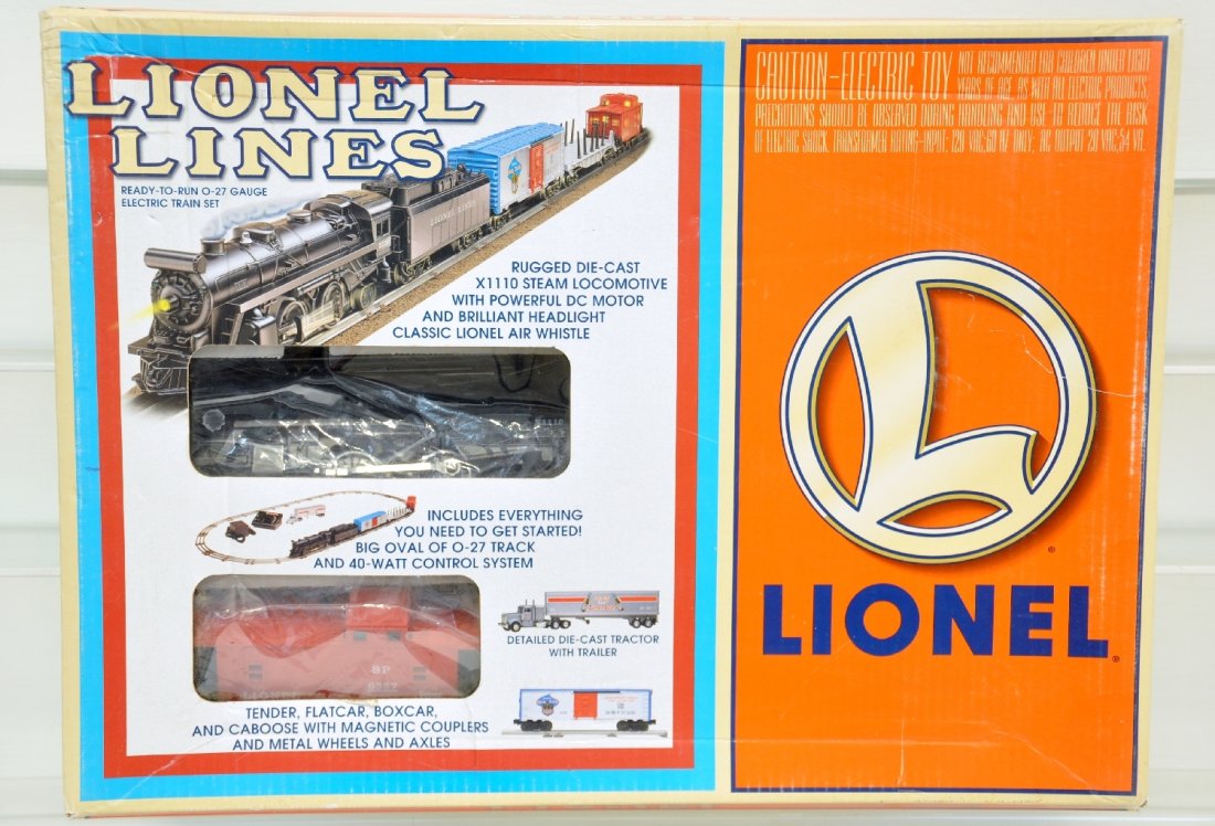 Lionel 11921 Lionel Lines Train Set: Includes an X1110 Columbia loco with whistling tender, flat, box, caboose & a tractor trailer. Also includes track & transformer. It shows light runtime with C8+ bodies, set box with inserts, C8