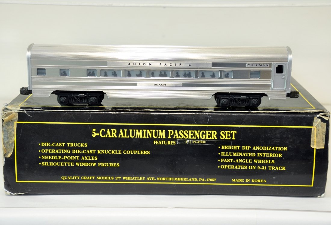 5Pc Weaver UP Aluminum Passenger Set: Union Pacific Passenger set comes equipped with Die-cast trucks, Operating knuckle couplers and illuminated interiors. Cars show light run time. C9