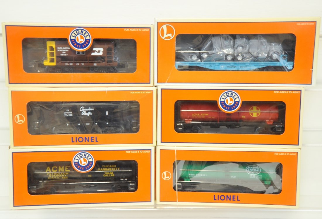 6 Mint Lionel Freight Cars: Includes 26134 Acme tank car; 26109 NYC tank; 17802 CP ore car; 26131 SF tank car; 1780-7 BN ore car; 36091 Maersk flat with trucks. All appear unrun with boxes, c10