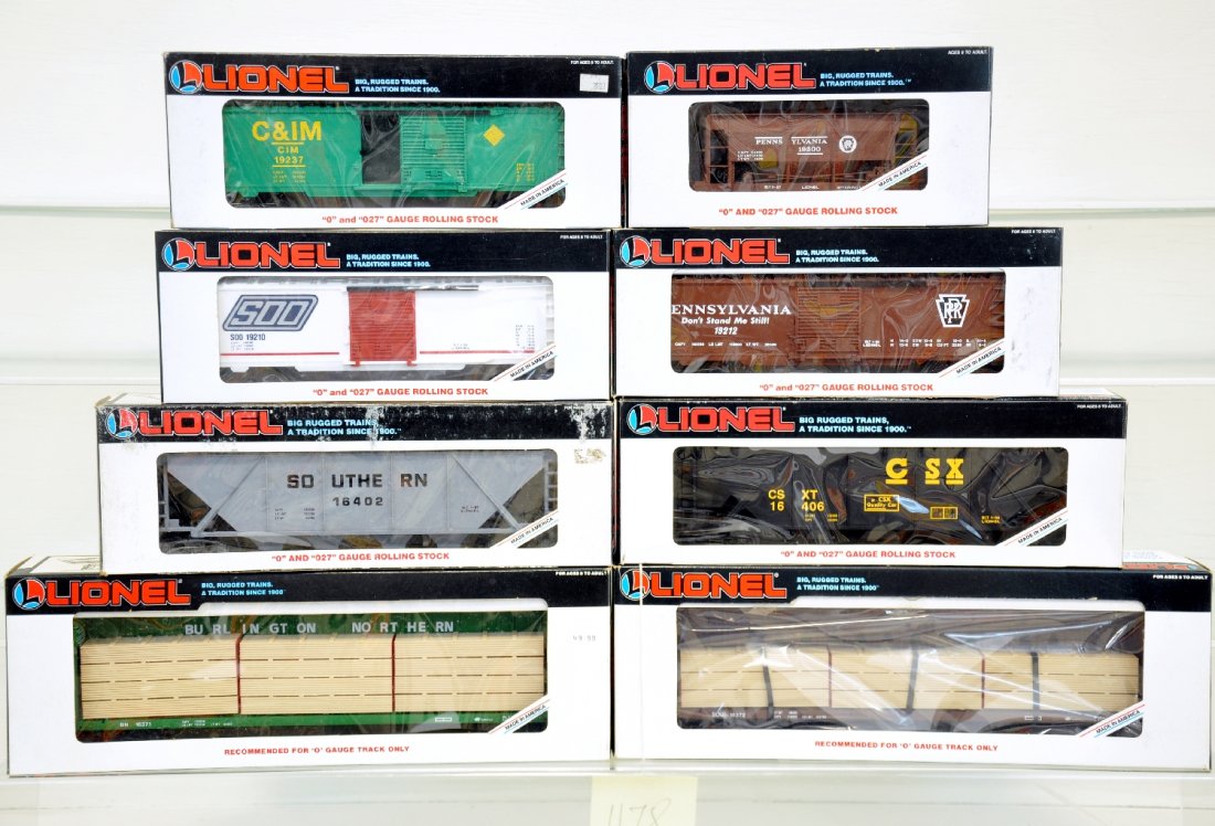 8 Lionel Freight Cars: Includes 16371 & 2 I-beam flats; 19237 boxcar; 16402 hopper; 19210 boxcar; 16406 hopper; 19300 ore car; 19212 boxcar. Some show light runtime, all have C9 bodies with boxes