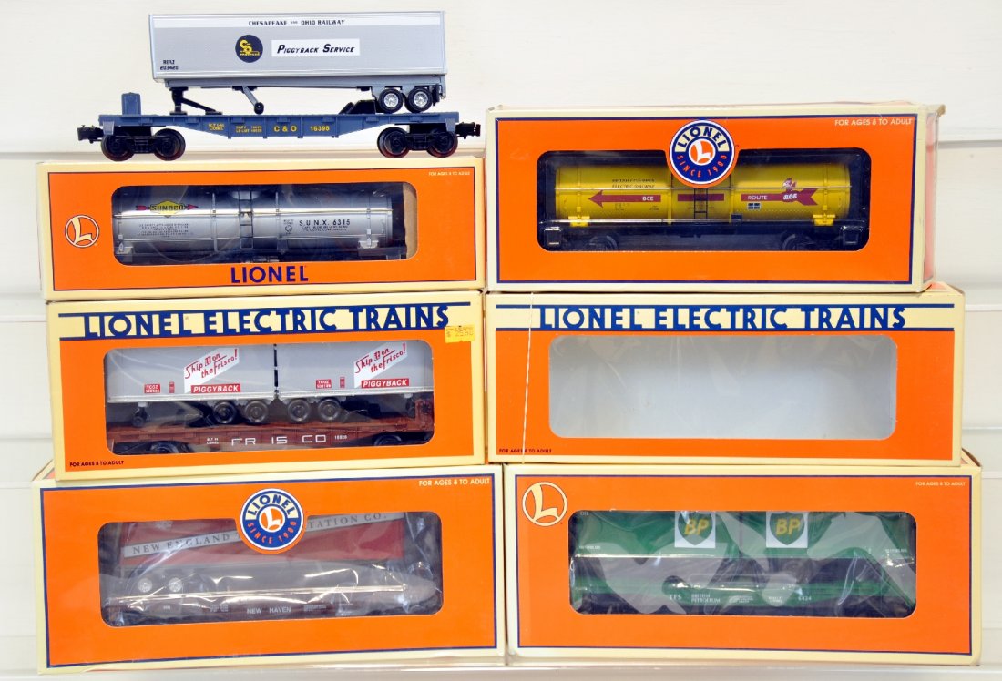 6 Lionel Trailer Flats & Tank Cars: Includes tank cars- 19607 Sunoco, 52231 BCE; Trailer flats- 52306 NETCA NET; 16926 Frisco; 16398 C&O; 26001 BP. All appear lightly run with C9 bodies & boxes