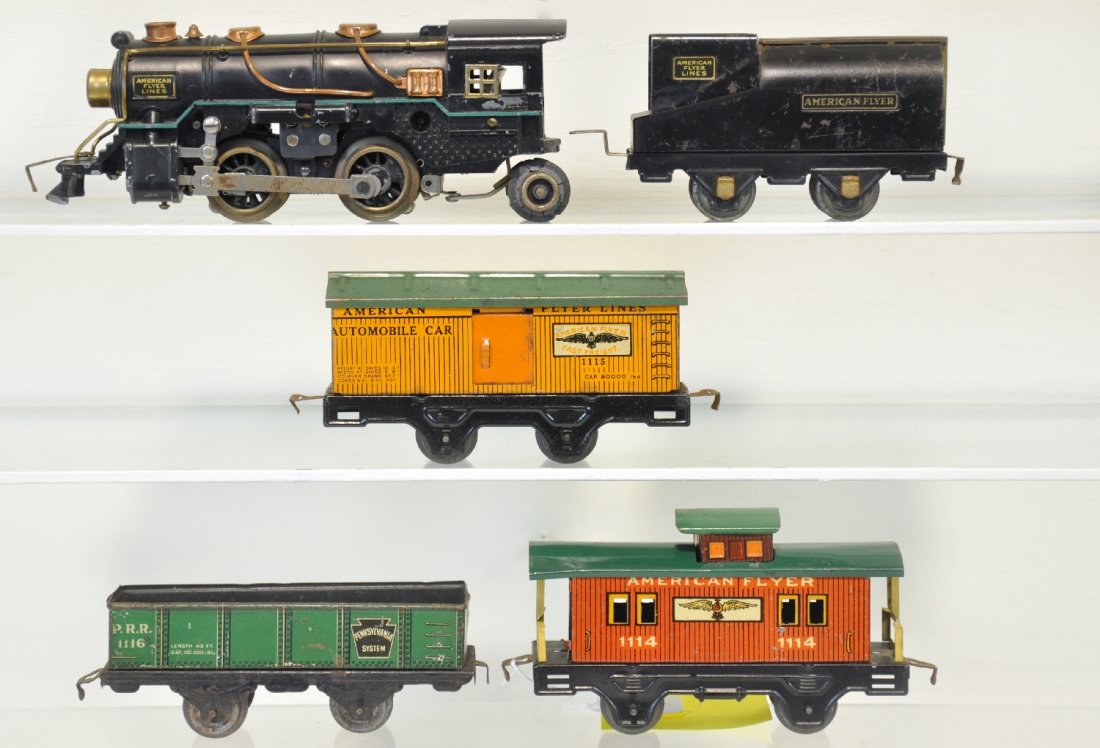 5Pc American Flyer Steam Freight Set: Includes a 420 steam loco, wheels fatigued, missing pony truck; vandy tender, 1 panel has a dent; 1116 PRR gondola; 1115 boxcar; 1114 caboose, all are clean, showing moderate playwear, otherwise C5+-6