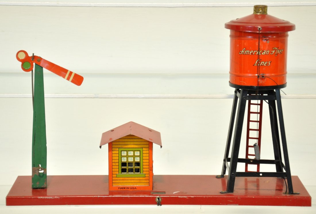 American Flyer 235 Water Tank Station: Nice 1930s platform accessory incorporating a 2010 water tank, shack & semaphore. It is unusually clean & shiny, just missing the tank's spout (repros are available) weight & string present. It shows 