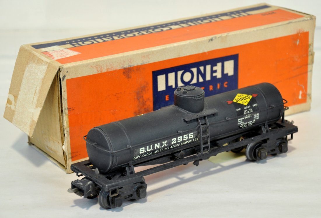 Boxed Lionel 2955 Sunoco Semi Scale Tank Car: Clean with awesome decals and straight frame. It has nice unhandled patina with 1941-2 couplers. It has its box, taped, missing flap 1 side with cotton wrapping & insert, C8 Nice example