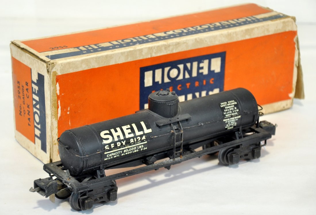 Boxed Lionel 2955 Shell Semi Scale Tank Car: Clean with 96% decals and slight distortion to frame. It has high box couplers. It has its worn box, taped, missing flap 1 side with cotton wrapping & insert, C6+-7