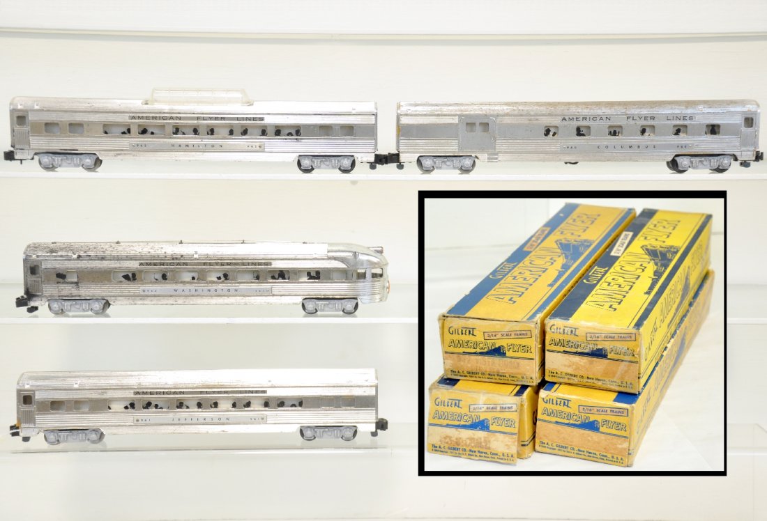 4 Boxed American Flyer Passenger Cars: S Gauge. All have chromed finish, including a 960 combine; 961 coach; 962 vista-dome & 963 observation. All show some black spots through finish, C3-5 with boxes