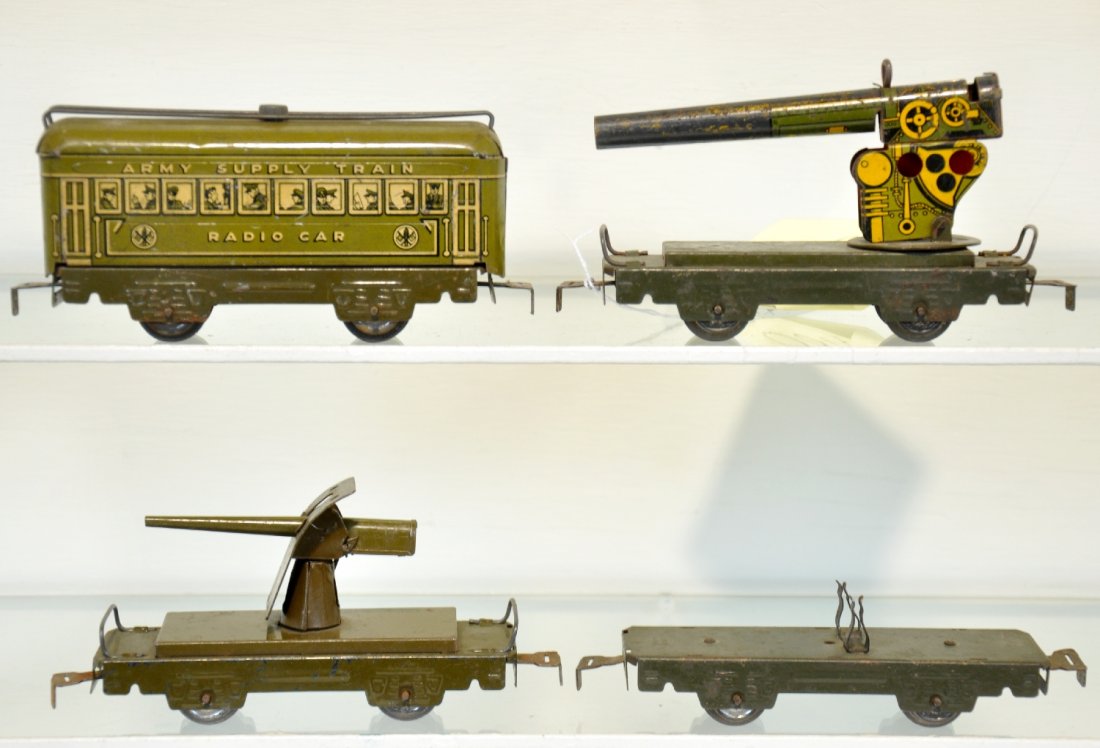 4 Pre War Marx Military Cars: Includes litho flak gun; crank AA gun, C6+; empty airplane flat; radio car, missing antennae, otherwise C4-5