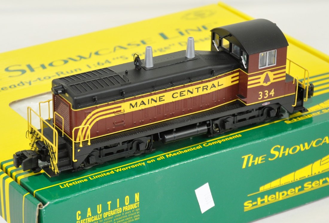 S-Helper 1501 MEC SW-9 Diesel: S Gauge. Showcase Line diesel cab #334, with nice detailing. It shows light runtime with C9 body & box