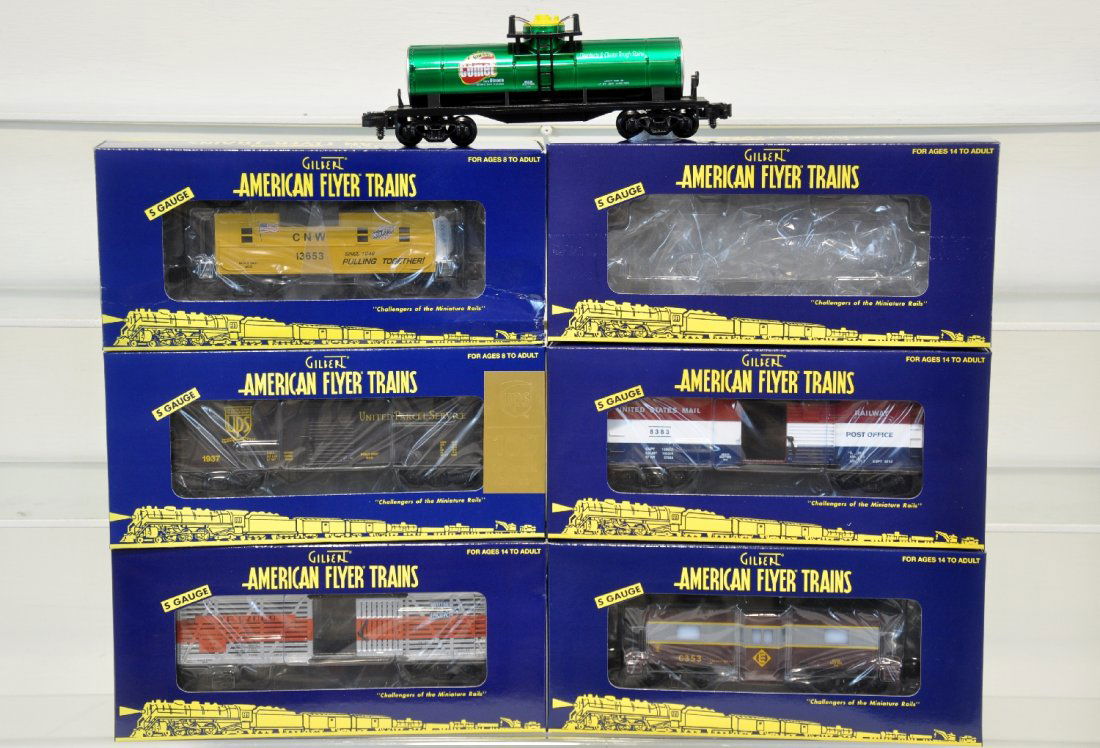 6 Lionel American Flyer Freight Cars: S Gauge. Includes 48430 Comet tank car; 48741 C&NW caboose; 48274 WP stock car; 48383 Post office car; 48370- UPS boxcar; 48750 Erie caboose. All are unrun with boxes, C10