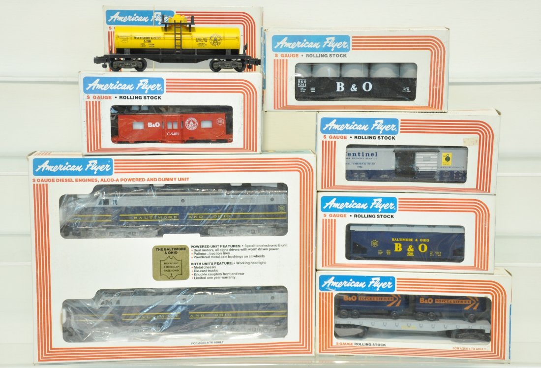 8Pc Lionel American Flyer B&O Freight Set: S Gauge. Includes 8153 B&O AA Diesels; 9102 tank car; 9301 gondola; 9201 hopper; 9000 flat with vans; 9702 boxcar; 9401 illuminated caboose. All are unrun with boxes, C10