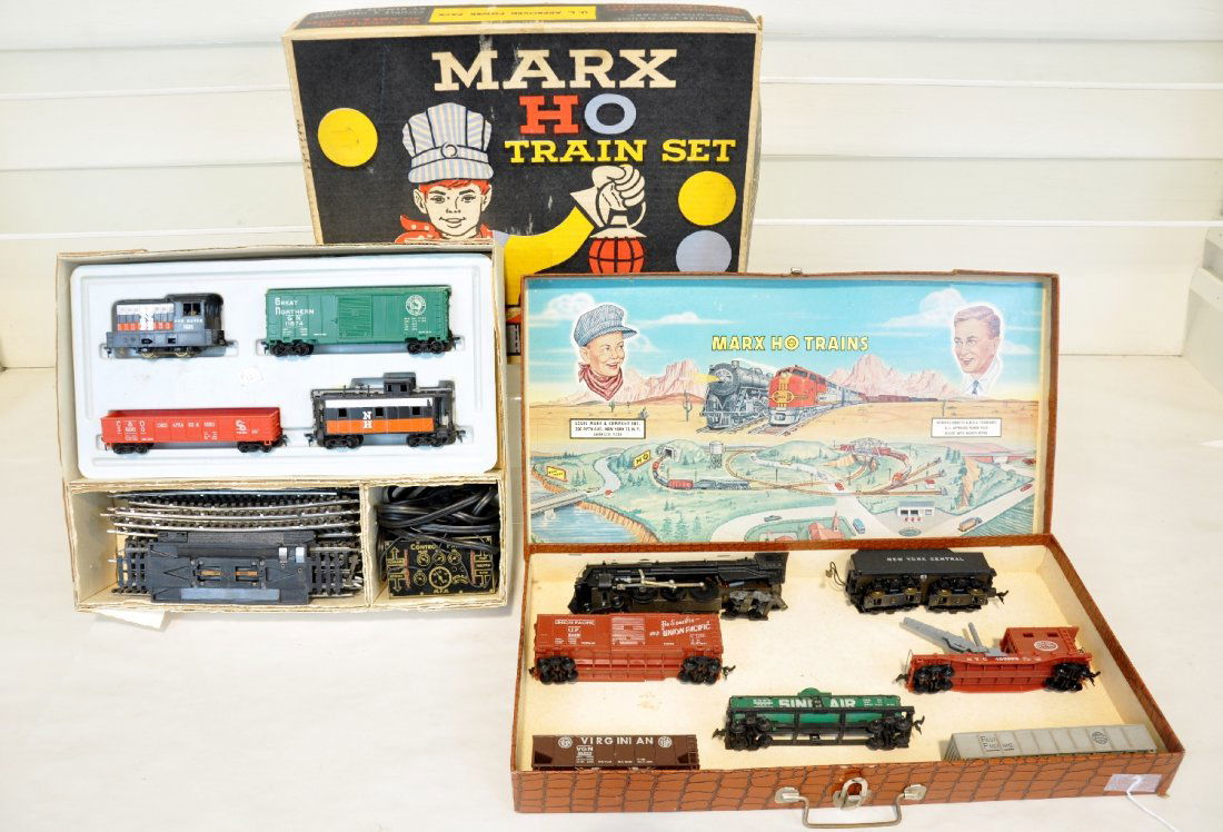 2 Boxed Marx HO Sets: Includes a suitcase set with cast Hudson & tender boxcar; tank car; hopper; gondola & caboose, nice set box, not insert; Set 16460 including a NH diesel; boxcar; gondola & caboose, track & transformer