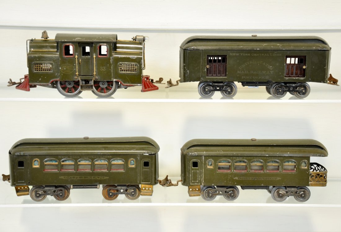 4Pc Lionel 33 Passenger Set: Standard Gauge. Includes a 33 electric loco; 32 baggage; 35 Pullman; 36 observation, all lettering readable, all shiny showing light to moderate playwear with some moisture spotting throughout, C6