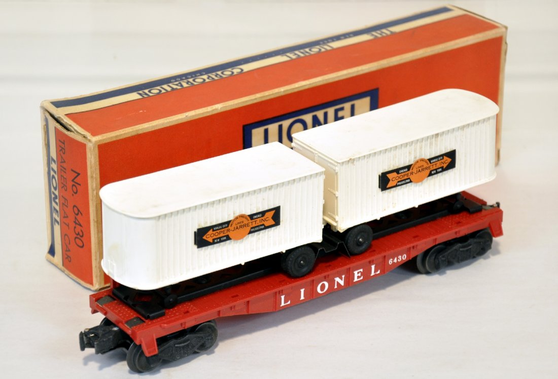 Mint Boxed Lionel 6430 Van Flat: Fairly clean with unrun flat. The box is C8 and the car should clean to C9