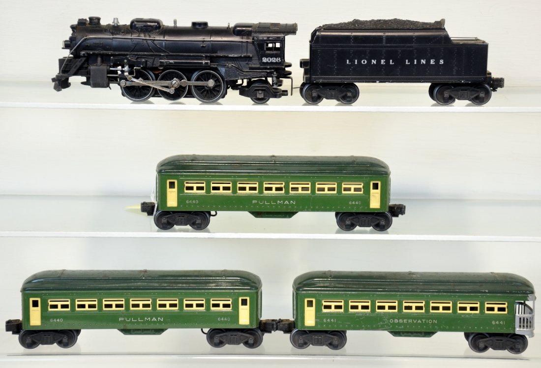 5Pc Lionel 2026 Passenger Set: Includes a 2026 steam loco, missing pony truck; 6466WX tender; 2 #6440 Pullmans; 6441 observation. All show moderate playwear with nice lettering, otherwise C6