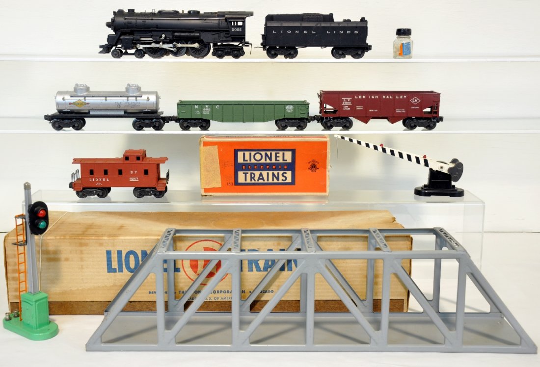 Lionel Train Set: Includes a 2055 Hudson loco with SP bottle; 6026W tender; 6456 hopper; 6465 tank car; 6462-25 gondola; 6257 caboose; 153 block signal, ob; 252 crossing gate & a boxed 317 trestle bridge. All show ligh