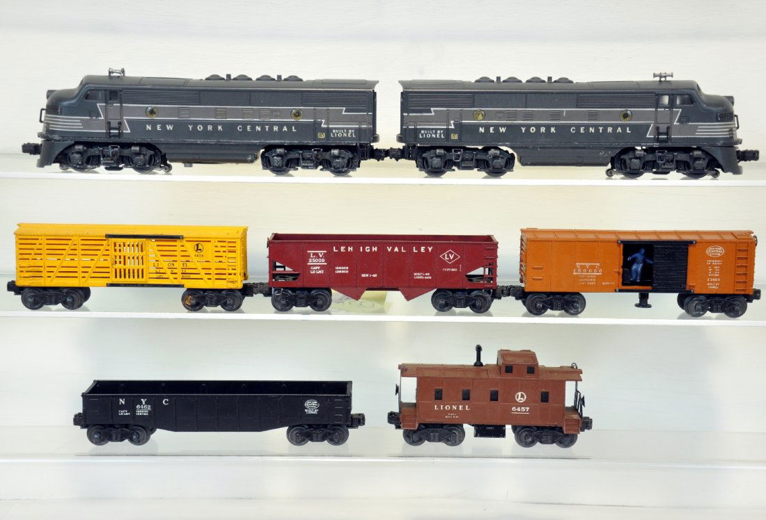 Lionel NYC Diesel Freight Set: Includes a 2344 NYC F3 AA Diesels, matching graphics with clean battery box; 3464 NYC operating boxcar; 6656 stock car; 6456 hopper; 6457 caboose. All show moderate playwear, C6