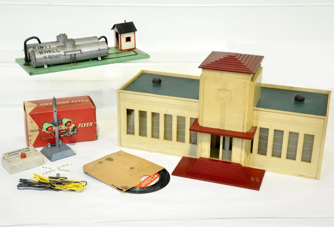 3 American Flyer Accessories: S Gauge. Includes a 799 talking station, 90% complete; 768 Shell Oil supply depot, black roof, both should otherwise clean to C6; boxed 760 flasher with trip, C8