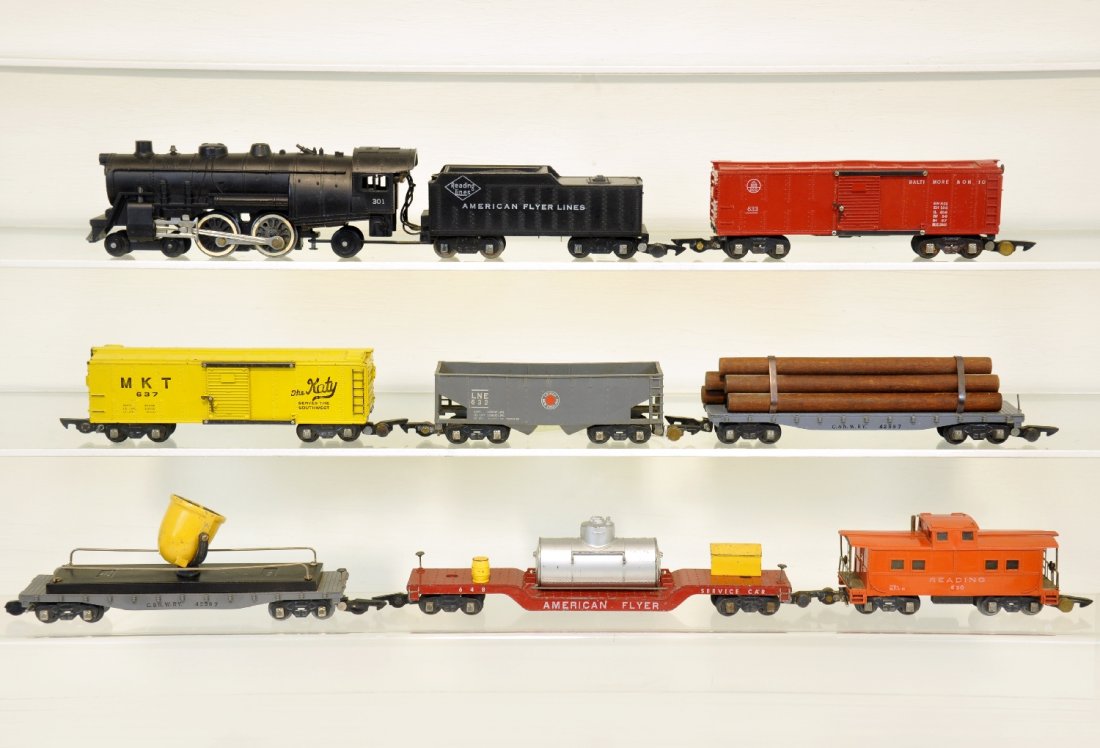 8Pc American Flyer Steam Freight Set: S Gauge. Includes 301 Reading Atlantic loco & tender with smoke & Choo-Choo; 632 LNE hopper; 633 B&O boxcar, ob; 628 log car; 637 MKT boxcar; 646 track cleaner; 634 searchlight; 630 caboose, ob. All s