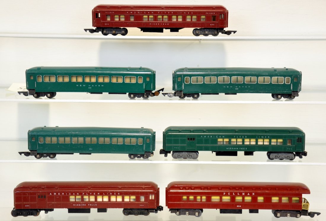 7 Assorted American Flyer Passenger Cars: S Gauge. Includes 654 observation, missing 1 coupler; 953 Combine, missing 1 window strut, 1 cracked; 652 Pikes Peak Pullman, all in red; 953 Niagara Falls combine; 3 #650 NH Pullmans, lettering on 1 