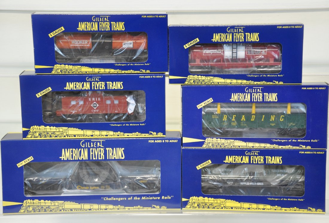 6 Pc Lionel American Flyer Freight Cars: S Gauge. Includes Hooker Three Dome Tank Car 48415, Campbell Soup Tank Car 48416, Erie Caboose 48733, Reading Gondola 48526, Chessie System Flatcar 48531, Supplee Flatcar 48543. These cars are unrun i