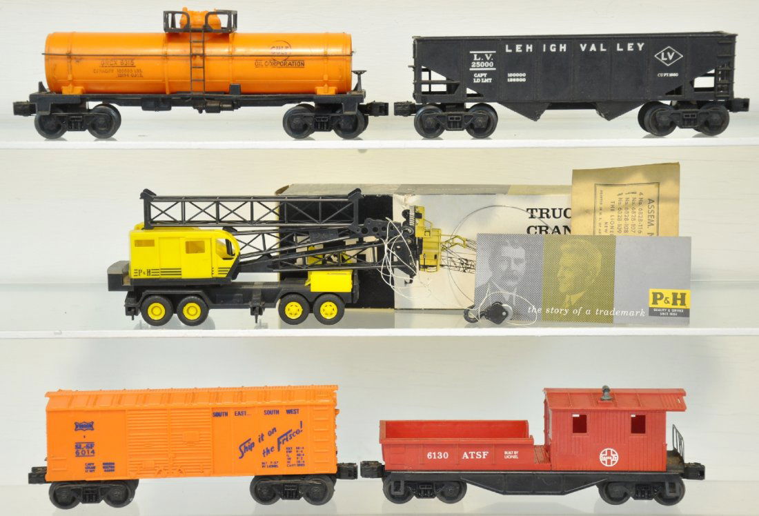 5Pc Lionel Rolling Stock & Load Group: Includes a boxed 6827 P&H crane, complete with pamphlets & packet, ob worn; 6130 SF work caboose; 6315 tank car, lettering light; 6176 hopper; scarce 6014 Frisco boxcar, blue lettering 1969 ONLY. Othe