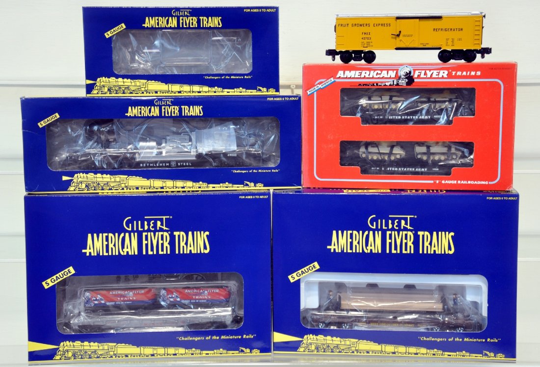 5Pc Lionel American Flyer Freight Cars: S Gauge. Includes Fruit Growers Express reefer 48814, Bethlehem Steel depressed center searchlight car 49032, US Army flatcar 48507, "Moe and Joe" operating lumber car 49015, 23830 piggyback unloader 
