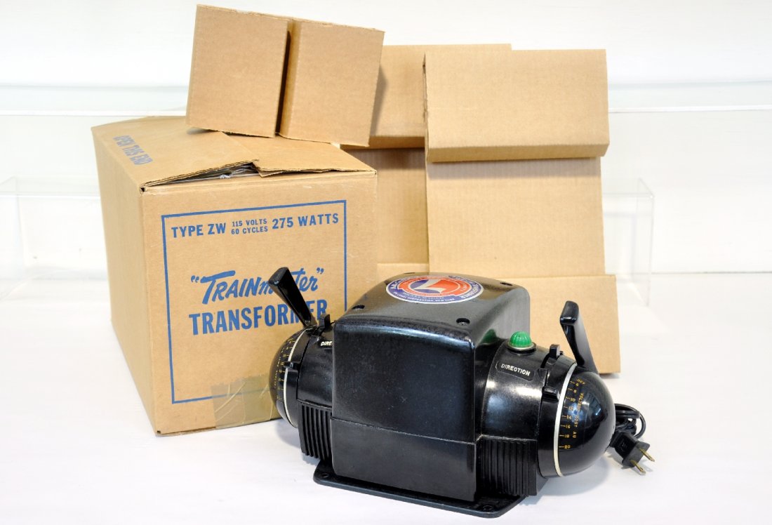 Clean Lionel ZW 275 Watt Transformer: 4-train power pack. It has a replaced cord and a clean case. C7+. Sold AS-IS