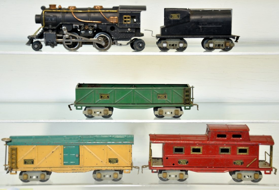 5Pc American Flyer Steam Freight Set: Includes a 420 steam loco with reverse; Vanderbilt tender; 3207 sand car; 3208 boxcar; 3211 caboose. They show moderate playwear, C5-6
