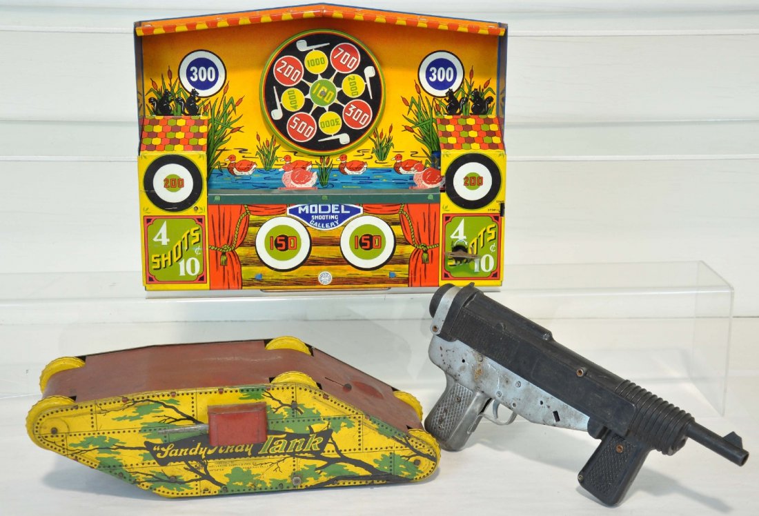 3Pc Vintage Toy Lot: Includes a Mattel cap machine gun, mechanism is functional; Unusual; Sandy Andy tank, mechanism is not functional, missing treads, but clean; boxed Wyandotte shooting gallery, mechanism functions with