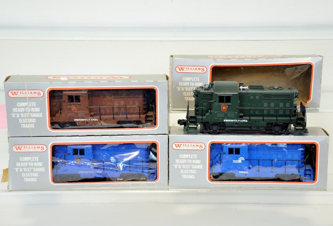 4 Boxed Williams Diesels: All small switchers including Conrail & 3 different PRR examples. All appear lightly run with shop worn boxes, C8+