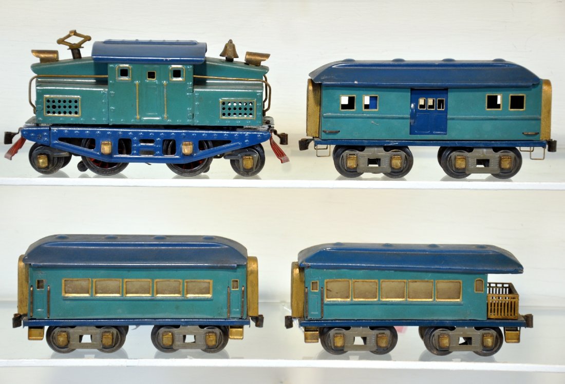 Custom American Flyer Passenger Set: Pre War. Nicely done using a 1218 style steeple cab with 3 passenger cars. All painted in Golden State colors, cars having added wood vestibules. Nice job!