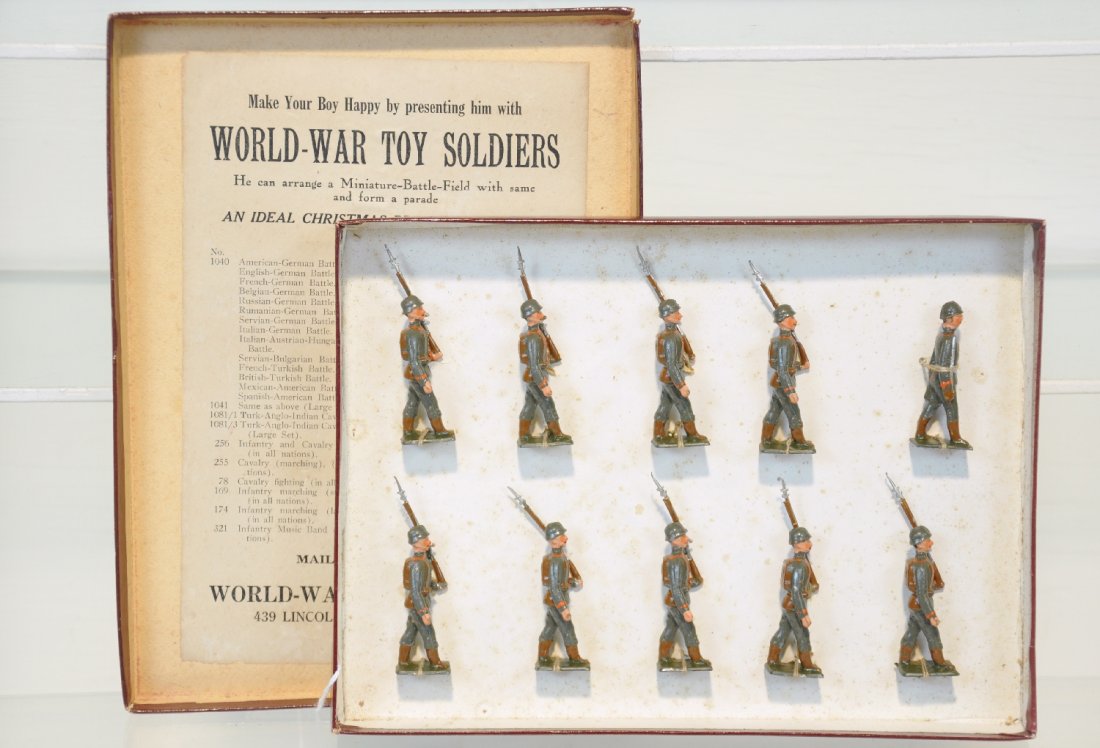 Boxed Heyde Set 407 German WWII Infantry: All original owner sets, bought from World War Toy Soldier Co., Brooklyn, NY. Includes 9 marching with officer. They are like new, tied in insert. It has its original box with American ad mounted insi