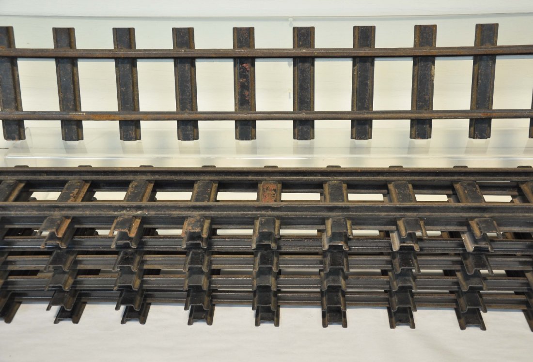7 Sections of Buddy L Straight Track: All fairly clean, each section is 46" long. There is a quantity of connecting plates and screws that show rust. This lot is very heavy, so watch shipping charges