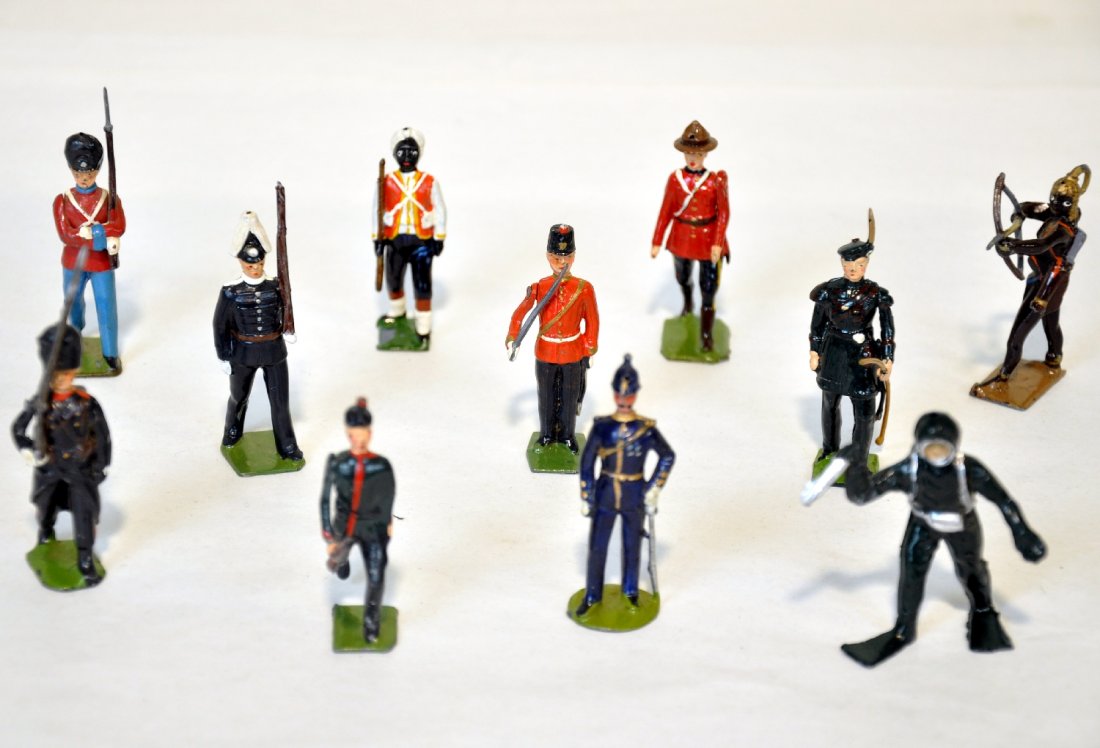 Assorted Britains Figures, Plus: Includes 202 Togaland Warrior; 2019 Danish guard; 2035 Svea Lifeguard; 98 Kings Royal Rifleman; 19 West India Regiment; 1554 Mounties; 9158 Fort Henry Guard; 2074 Royal archer; Plus a Timpo Frogman; &
