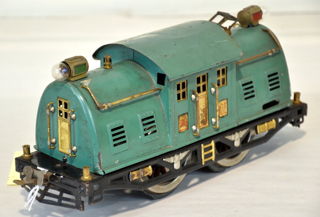 Lionel 10E Locomotive: Standard Gauge. Clean 10E loco, wheels show fatigue and missing 1 hand rail. Otherwise has nice paint, showing light to moderate playwear, C6+-7