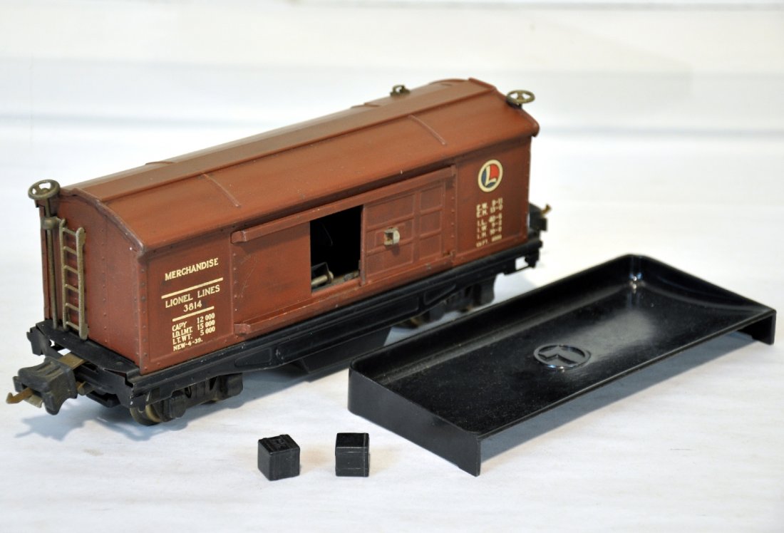 Nice Lionel 3814 Merchandise Car: 1938 version with nice decals. It is clean with nice matte patina and unscratched fish belly. It shows light playwear, with 2 original cubes & 160 bin, C8