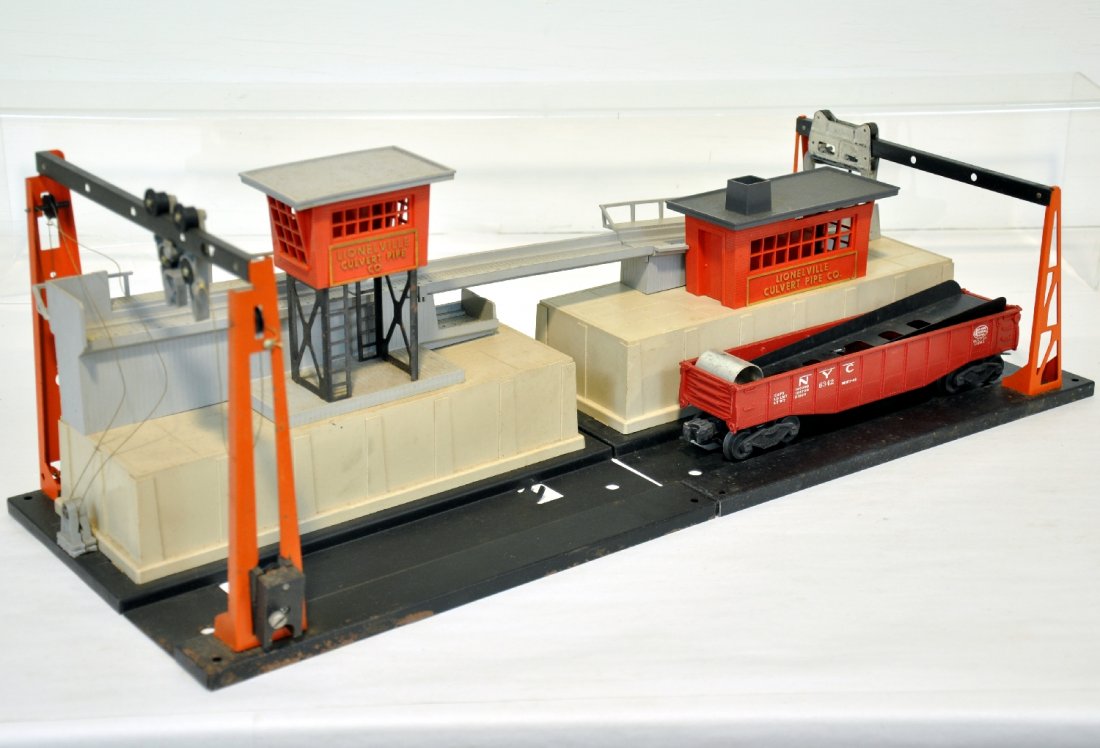 Lionel 342 & 345 Culvert Accessories: Includes the 342 loader with 6342 gondola & 1 pipe; 345 unloader with bridge, broken railing, weight loose. They show moderate playwear, C6