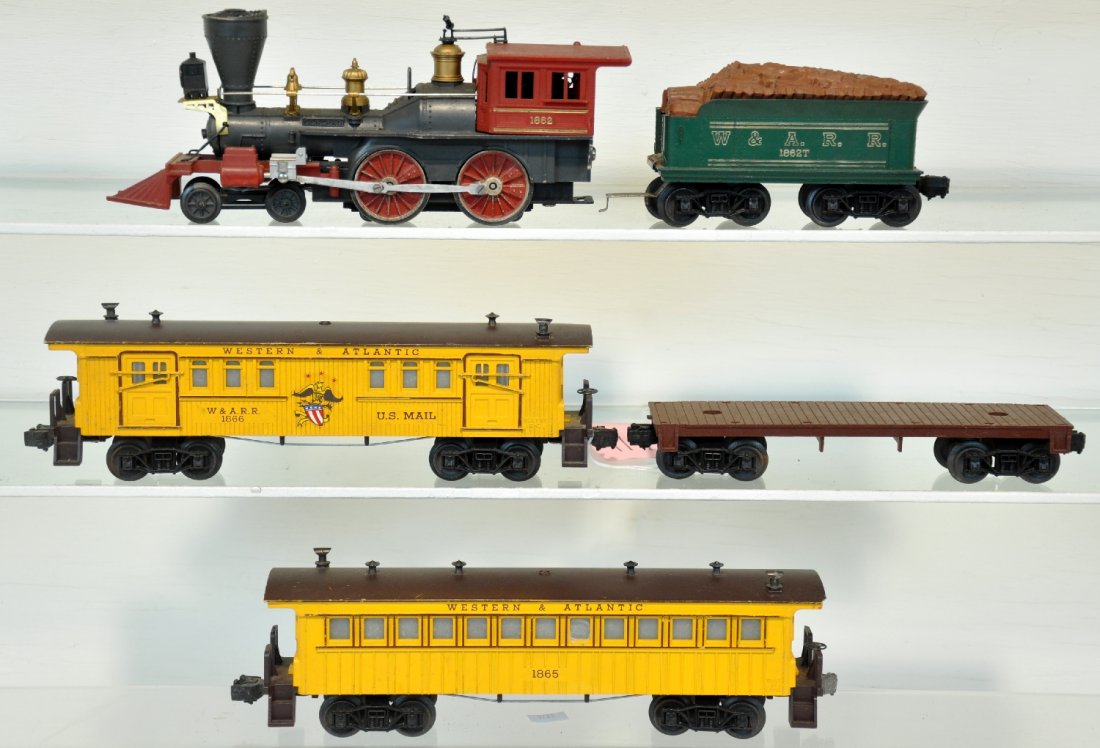 Lionel General set: Includes an 1862 Wm Crooks loco, whistle intact with stack cover; 1862T tender; 1865 baggage; 1866 coach; empty flat car. All show light to moderate playwear, C6
