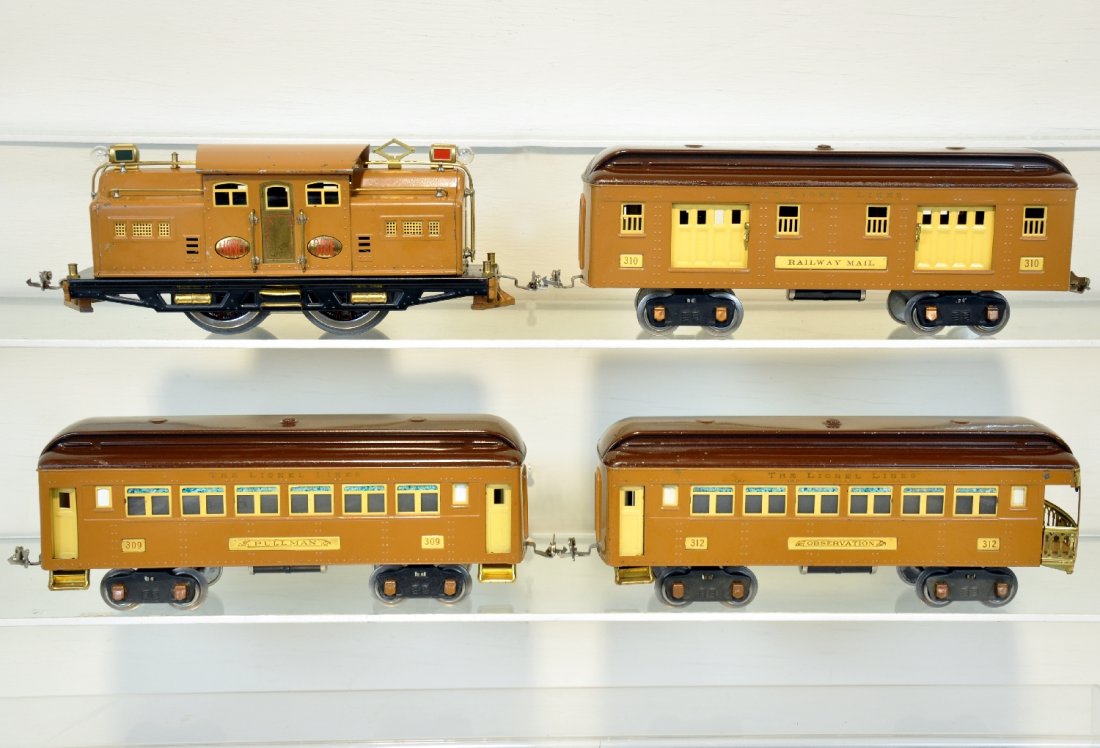 Nice Lionel Baby State Set: Standard Gauge. Includes a 318E electric loco, rewheeled, rewired & ready to run. Early bus bar version with brown pilots; 310 baggage; 309 Pullman; 312 observation. All are very shiny, clean with nic