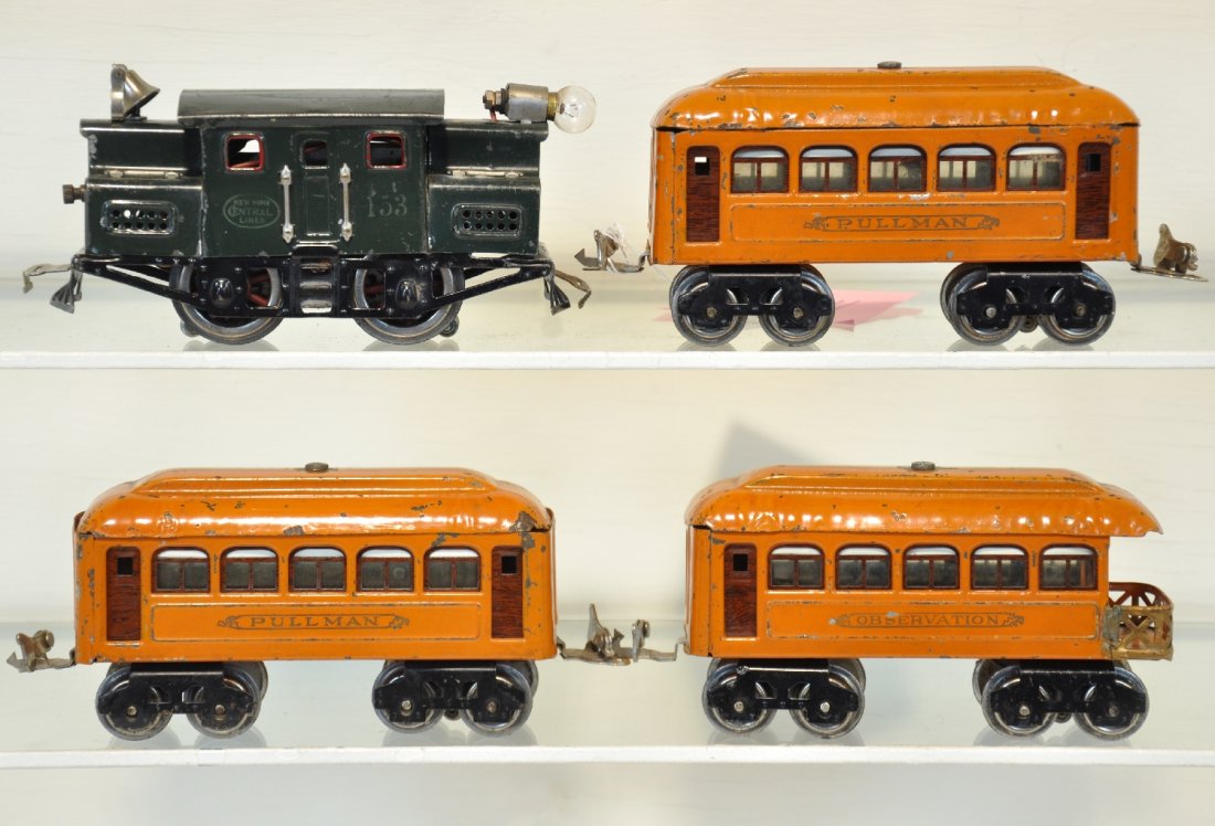4Pc Early Lionel Passenger Set: Includes a 152 electric loco, replaced pick-up plate, nice lettering; 2 #603 Pullmans; 604 observation. All are clean & shiny, showing moderate playwear, C5+-6