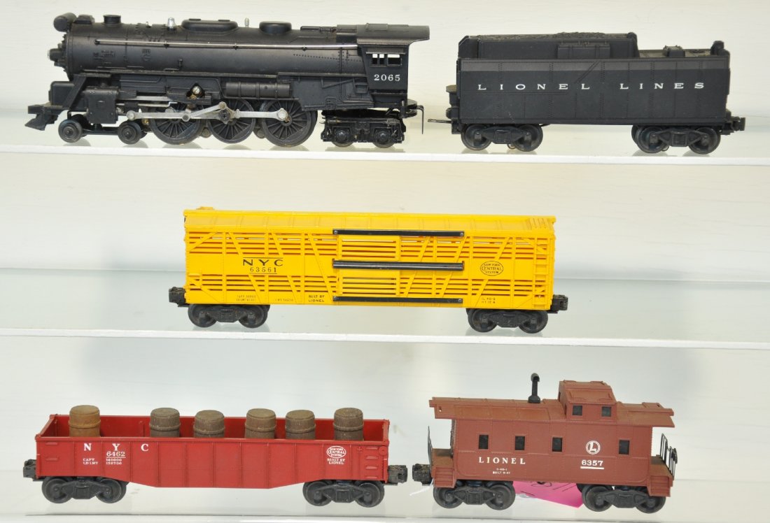5Pc Lionel 2065 Freight Set: Includes a 2065 steam loco; 6026W tender; 6462-125 gondola with barrels; 6356 NYC stock car; 6357 caboose. All show light playwear, C7-7+