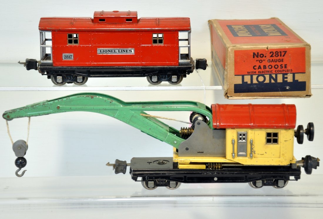 Lionel 810 & Boxed 2817 Freight Cars: Includes an 810 late derrick, regeared and functional; 2817 caboose with worn box. They show moderate playwear, C5+-6+