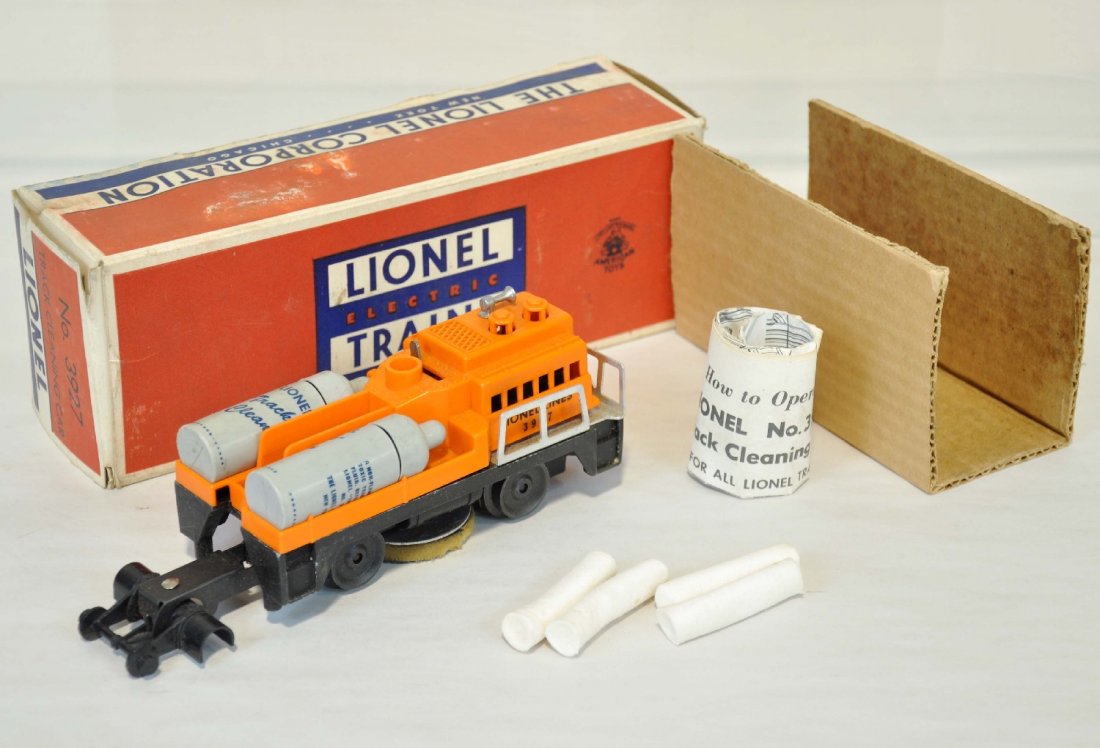 Boxed Lionel 3927 Track Cleaner: Clean & complete, minus liquid with wipes and instruction. It shows light playwear with stained box & insert, C7-7+