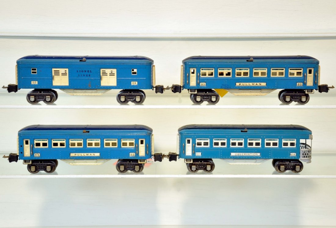 4 Lionel Blue Comet Cars: Circa 1936. Includes a 615 baggage car, restored; 2 #613 Pullmans & 614 observation, all with manual box couplers. They are clean and show light to moderate playwear, otherwise C7-7+