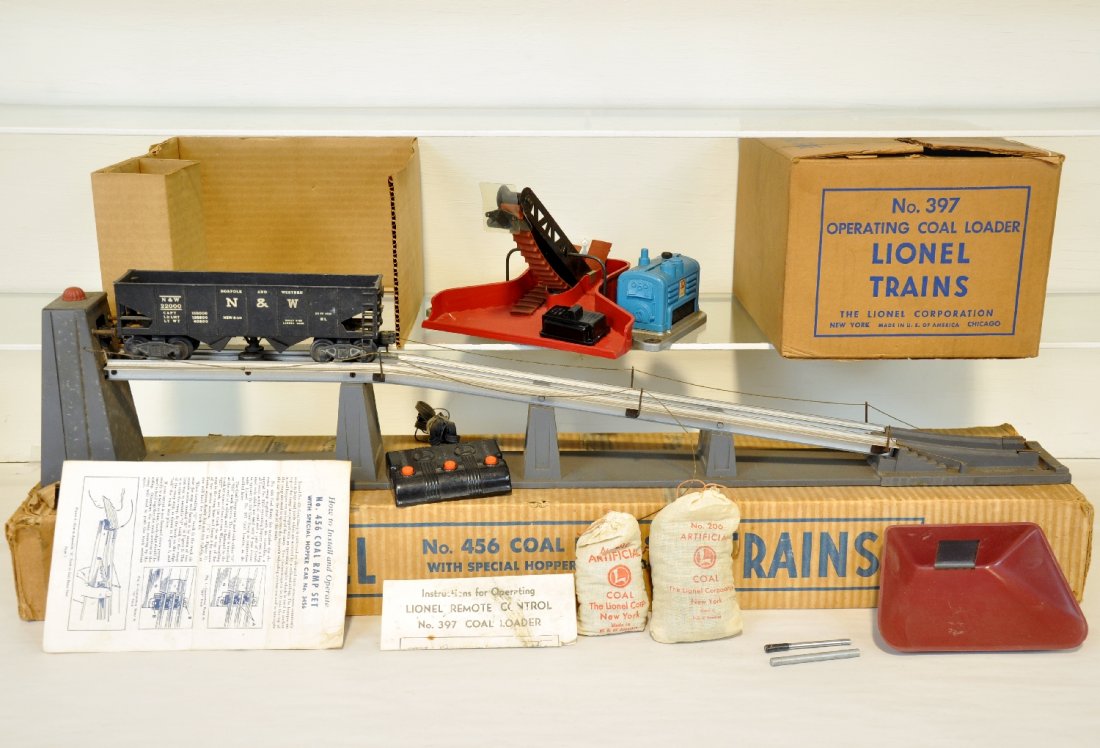 Boxed Lionel 456 & 397 Coaling Accessories: Includes a 456 coal ramp set. Handrails are broken, otherwise appears complete with box & 3456 hopper; 397 coal loader, complete, just needs belt replacement with box, coal & insert. They show moderat