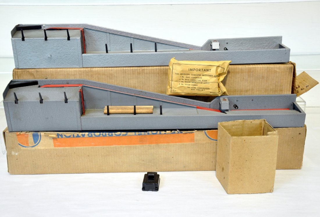 2 Different Boxed Lionel 364 Loaders: Includes both the smooth and crackle finish examples, 1 with packet, other has 3 logs & insert. Both show light playwear with C8 boxes, C7+